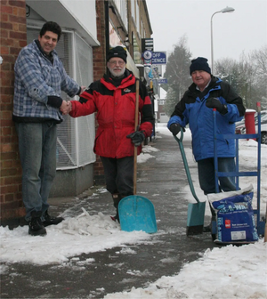 Image courtesy of Bill Lewis Snow wardens with shop keeper - winter 2012/13